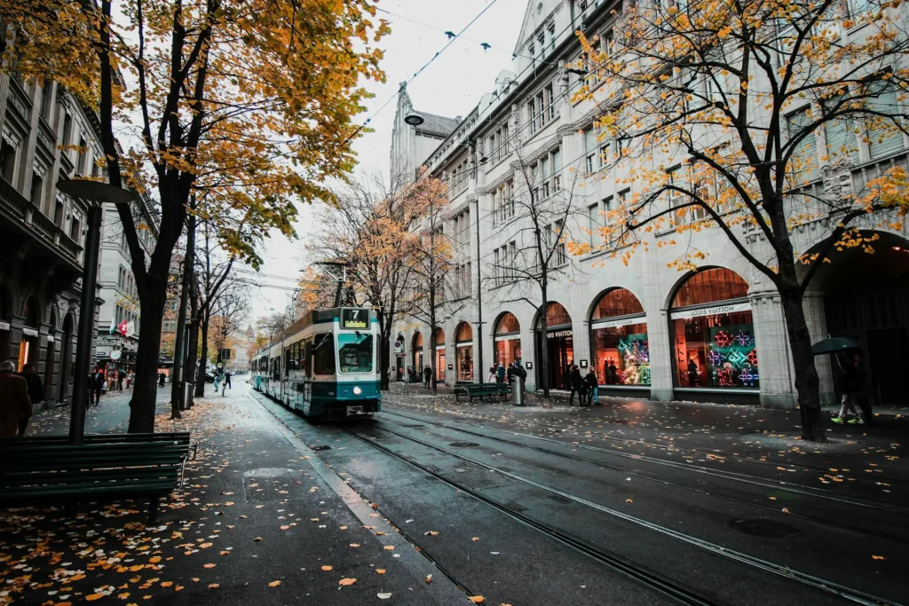 a train passing on a street in Zurich